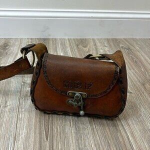 Vintage brown leather MPF BOHO HAND TOOLED PRINTED PURSE WITH HOOK CLOSURE